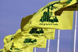 Hezbollah flags flutter in the Lebanese southern village of Mais el-Jabal, 20 February 2007 located at the border with Israel