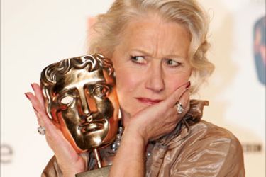 British actress Helen Mirren poses with the award for 'Best Actress In a Leading Role' for the film 'Queen' during the British Academy of Film Awards (BAFTA) ceremony at the Royal Opera House in central London, 11 February 2007