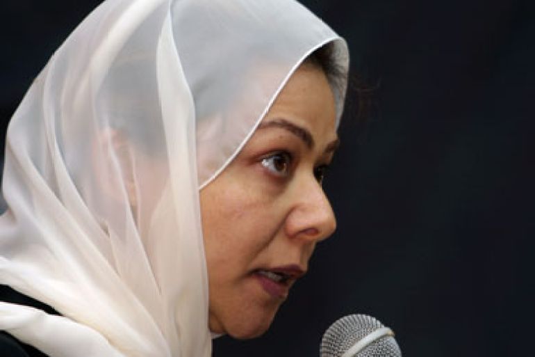 Raghad Saddam Hussein, daughter of the deposed Iraqi president Saddam Hussein, speaks at a memorial service for her father in Sanaa