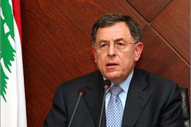 AFP/Lebanese Prime Minister Fuad Siniora speaks during a press conference in Beirut, 13 February 2007. Siniora vowed to pursue the "terrorists" behind today's deadly bombings which he said were carried out by the same forces who murdered his predecessor Rafiq Hariri