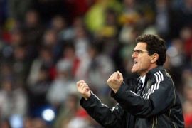 Real Madrid's Italian coach Fabio Capello shouts instructions to his players during the first leg of a last 16 Champions League football match against Bayern Munich at the Santiago