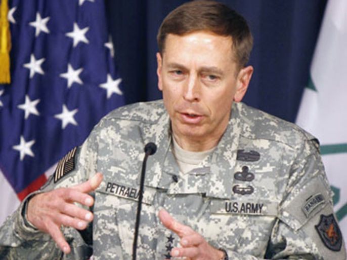 U.S. military commander in Iraq General David Petraeus gestures during a news conference in Baghdad March 8, 2007. Petraeus said on Thursday he currently saw no