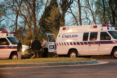Ambulances sit outside the Medical Examiner's office where victims from the mass shooting at Virginia Tech were taken 16 April 2007 in Roanoke, Virginia. A gunman opened fire on