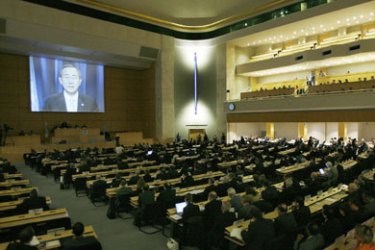 U.N. Secretary-General Ban Ki-moon delivers a speech by video to the Conference on Iraqi Refugees at the United Nations european headquarters in Geneva
