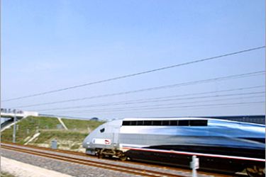 AFP / France's V150 TGV fast train goes on the new high-speed line, 03 April 2007 near Reims (eastern France). Later the TGV sets a new world speed record for a train on rails, hitting 574.7 kilometres per hour (357 miles per hour) on a 73-kilometre (45.3 mile) stretch of track between Paris and the eastern city of Strasbourg, The record -- easily beating the