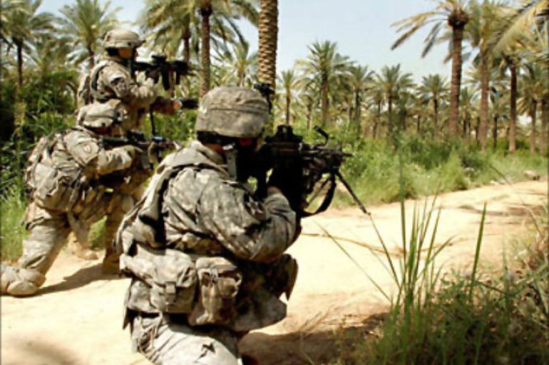 f_A picture released by the US Army 30 May 2007 shows US soldiers taking aim at suspected insurgents in Taji, Iraq, 29 May, 2007. Ten American soldiers were killed in Iraq on