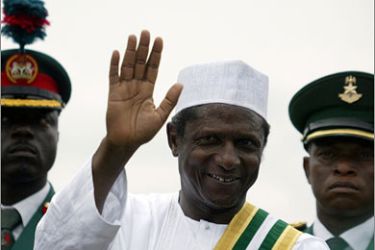 AFP/Nigeria's new president Umaru Yar'Adua waves to the crowd in an open vehicle following a swearing-in ceremony at the Eagles Square in Abuja 29 May 2007. Oil-rich Nigeria was to get a new government as outgoing President Olusegun Obasanjo prepared to hand over to Umaru Yar'Adua,