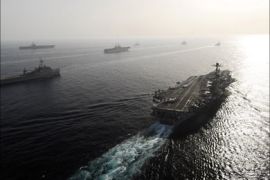 f_A picture released by the US Navy 24 May 2007 shows US warships: USS John C. Stennis (L), USS Nimitz (R), and USS Bonhomme Richard along with USS Antietam,