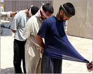 محتجزون عراقيون على ذمة المفقودين الأميركيين (رويترز)