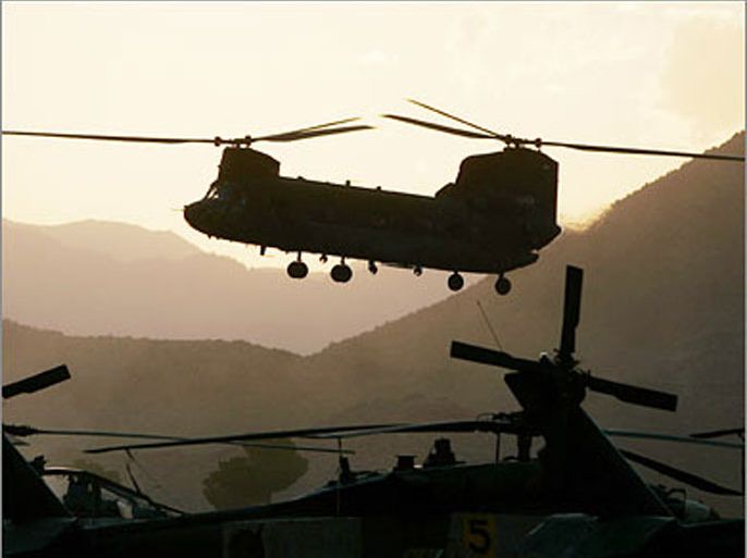 AFP/(FILES) Photo dated 21 May 2007 shows a US Chinook helicopter landing at Salerno Air field in Khost province of Afghanistan 150 km south east of Kabul