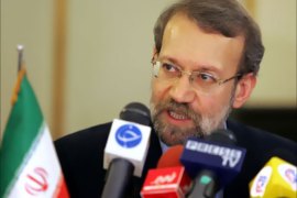 AFP/ Iran's top nuclear negotiator Ali Larijani answers reporters' questions during a press conference at Mehrabbad Airport in Tehran, 30 May 2007.