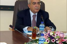 New prime minister Salam Fayyad chairs a meeting of the new 12-member government in the West Bank political capital of Ramallah 18 June 2007,