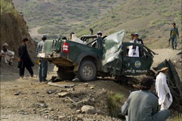 r_A destroyed police vehicle is seen after a blast in the Qalandar district of the southeastern province of Khost June 20, 2007