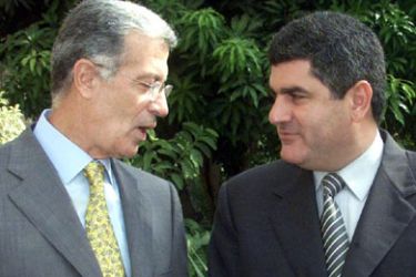 (files) This picture taken 28 September 2000 shows Abdel Hakim Nasser, son of late Egyptian President Gamal Abdel Nasser (C) and Ashraf Marwan (L),