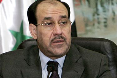 REUTERS/ Iraq's Prime Minister Nuri al-Maliki speaks during a meeting with members of the Iraqi High Commission for Elections in Baghdad July 1, 2007. REUTERS/Ceerwan Aziz (IRAQ)