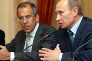 AFP/ Russian President Vladimir Putin (R) speaks as Russian Foreign Minister Sergey Lavrov (L) listens during their meeting with Chinese Foreign Minister Yang Jiechi (not pictured) in Novo-Ogaryovo presidential residence outside Moscow, 13 July 2007.