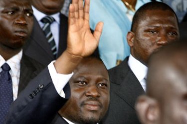AFP/ Ivory Coast's rebel-leader-turned-Prime-Minister Guillaume Soro waves to the crowd upon his arrival at the airport in Abidjan 09 July 2007.