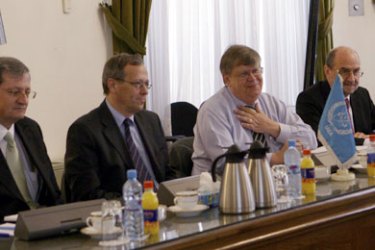 R / The International Atomic Energy Agency (IAEA) deputy director Olli Heinonen (C) attends a meeting with the team of Iranian nuclear officials in Tehran July 11, 2007.