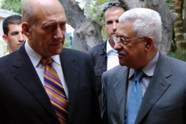 A handout picture by the Palestinian Press Office (PPO) shows Palestinian leader Mahmud Abbas (R) meeting with Israeli Prime Minister Ehud Olmert in Jerusalem,