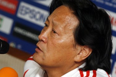 Chinese football team head coach Zhu Guanghu talks to the media during the press conference for the group C of the Asian Football Cup 2007 in Kuala Lumpur,