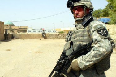 AFP/ US soldiers patrol an area in central Baghdad, 13 July 2007. US President George W. Bush insisted the Iraq war could still be won and dismissed mounting calls for a change in strategy as US lawmakers voted again for troop withdrawals.