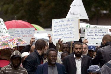 AFP/ Muslim protesters demonstrate outside the editorial office of the local newspaper Nerikes Allehanda 31 August 2007, in Orebro.