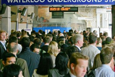 afp : Passengers jostle to enter the Underground station at Waterloo Station in central London, 04 September 2007, as commuters battled with severe transport disruption to get to