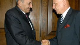 afp : Lebanese Parliament Speaker Nabih Berri (L) shakes hands with Russian Deputy Foreign Minister Alexander Saltanov at his residence in Beirut, 14 September 2007.