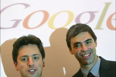 afp - Picture taken 07 October 2004 shows Google founders Sergey Brin (L) and Larry Page posing for photographers prior to presenting their new Google Print product at the