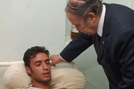 AFP/ Algerian President Abdelazziz Bouteflika comforts a wounded victim at a local hospital following a suicide bombing in the Algerian city of Batna, 460 km east of the capital Algiers, 06 September 2007