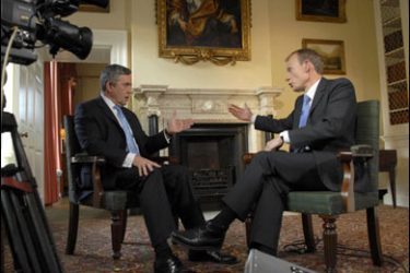 r/Britain's Prime Minister Gordon Brown (L) is seen in this handout photograph speaking to journalist Andrew Marr in a televised interview at his official residence in Downing Street in London, October 6, 2007.