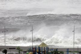 Giant wave hits the shores of Nanfangaou fish harbor in Ilan county, eastern Taiwan, 06 October 2007. Typhoon Krosa pounded northern Taiwan with powerful winds and torrential