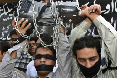 Journalists protest a crackdown on the media during emergency rule in Multan