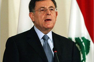 AFP / Lebanon's Prime Minister Fuad Siniora gives a speech to announce the annual report of his government at Beirut's Govermental Palace, 20 November 2007. Lebanon's