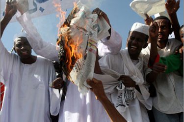 REUTERS/Protesters burn the picture of British teacher Gillian Gibbons during a demonstration after Friday prayers in Khartoum,