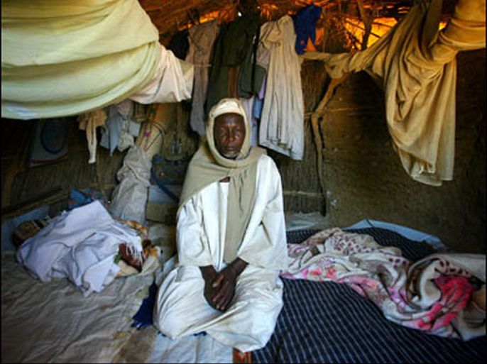 F/TO GO WITH AFP STORY BY SOPHIE LAUTIER - This picture taken 20 November 2007 shows Souleymane Adam, a 55-year-old Darfouri refugee, taken in his tent in the Sudanese refugees camp run by the NGO 'Eastern Chad' in Gaga, near the border with Darfur. Souleymane Adam lost his fields and his cattle in August 2004 after a Janjaweed attack in his village of Firna, western Darfur. Since then he has been a refugee at the camp of Gaga.