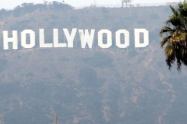 R/ The Hollywood sign is seen on a hazy afternoon in Los Angeles, California, November 4, 2007. Film and television writers and representatives of U.S.