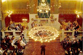 AFP / Members of the small remaining Egyptian Jewish community congregate in the Shaar Hashamayim Synagogue in Cairo, also known as Temple Ismailia or Adly Synagogue, to commemorate its centennial 31 October 2007. About one