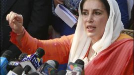 R/Pakistani opposition leader Benazir Bhutto speaks during a news conference at her residence in Lahore November 16, 2007. Pakistan freed Bhutto from house arrest on Friday shortly before a top U.S. diplomat was to visit, hoping to help put the country's "derailed" political process back on track. REUTERS/Mian Khursheed (PAKISTAN)