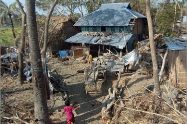 AFPA Bangladeshi cyclone-affected child runs in the yard of their devastated house in Chailtatoli village on the southern coastal area of Bangladesh,