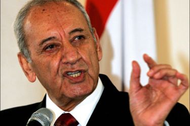 afp : (FILES) Lebanese Parliament Speaker Nabih Berri gestures during his press conference in Beirut, 25 October 2006. Berri has postponed a parliament session to vote for a