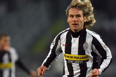 Juventus' Czech midfielder Pavel Nedved celebrates after scoring during their Italian Serie A football match Juventus vs Atalanta at Olympic stadium in Turin