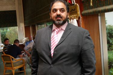 R/ British Muslim politician Lord Ahmed, a member of Britain's upper house of parliament, is seen in a hotel lobby in Khartoum, December 1, 2007.