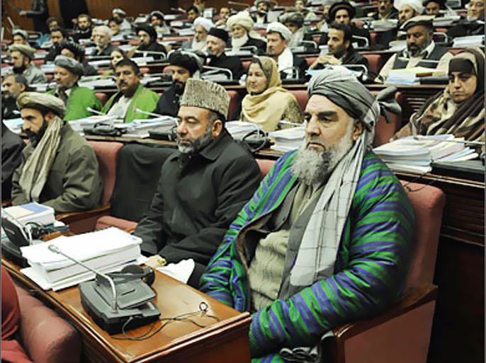 AFP Members of Parliament listen to the opening address by Afghan President Hamid Karzai in Kabul, 21 January 2008, during the opening session