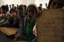 REUTERS/Children recite the Koran at a school in the southern city of Tamanrasset January 6, 2008.