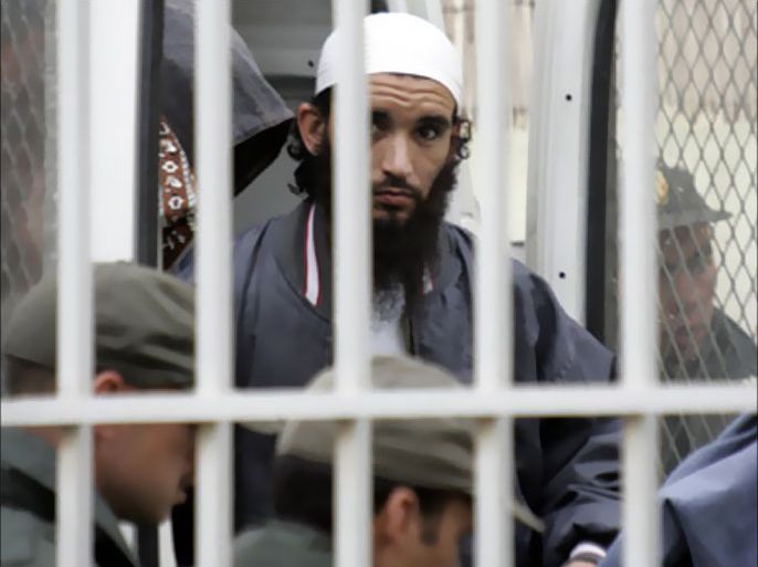 One of 51 Islamist linked to Ansar El Mahdi group, arrives for his trial at the anti-terrorist tribunal in Sale, near Rabat, 04 January 2008. The Verdict in the trial on terror charges of the 51 Islamists is due today.