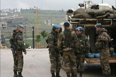 r_French U.N. peacekeepers, part of the United Nations Interim Forces in Lebanon (UNIFIL), make a stop during patrol in Yaroun village near the Israeli -Lebanese border, southern