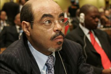 r - Ethiopian Prime Minister Meles Zenawi listens during the official opening of the 10th African Union Heads of State summit in Ethiopia's capital Addis Ababa January 31, 2008