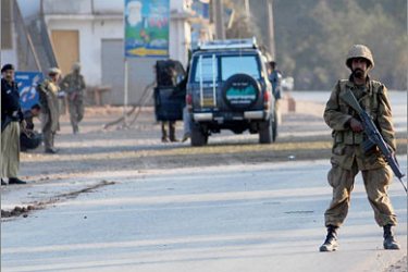 AFP/Pakistani army soldiers and policemen cordon the area after a bomb explosion near the security forces convoy at the lawless town of Darra Adam Khel,