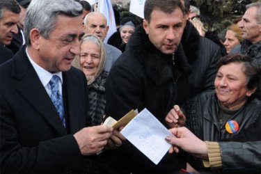 Armenian Prime Minister and presidential candidate Serzh Sarkisian speaks with people during his election rally in the town of Abovyan outside Yerevan on February 16, 2008.
